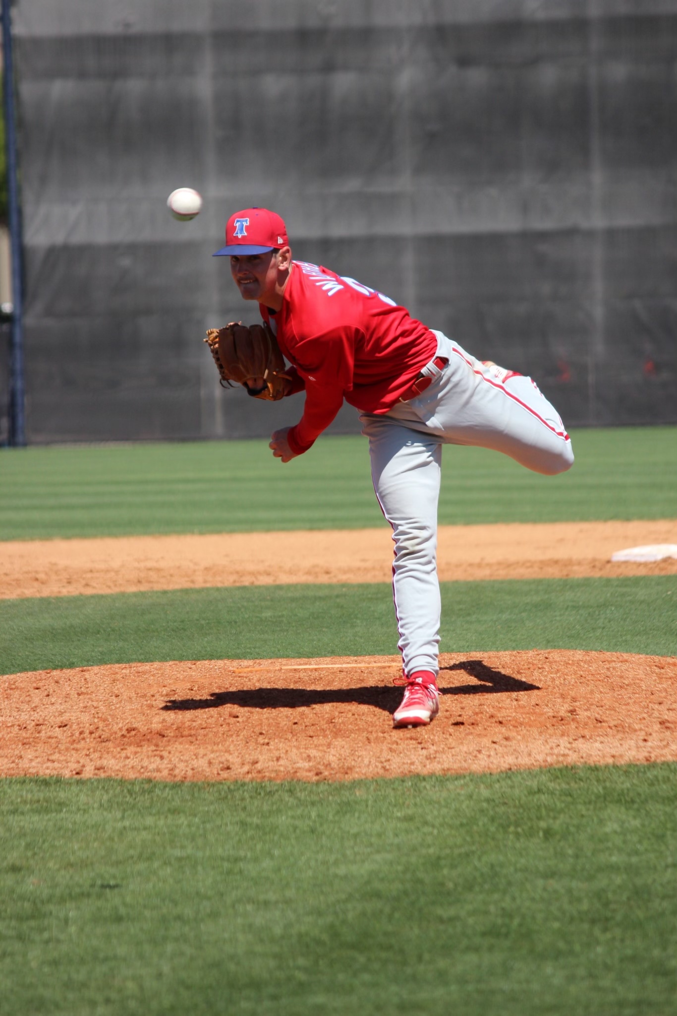 Zach pitching baseball